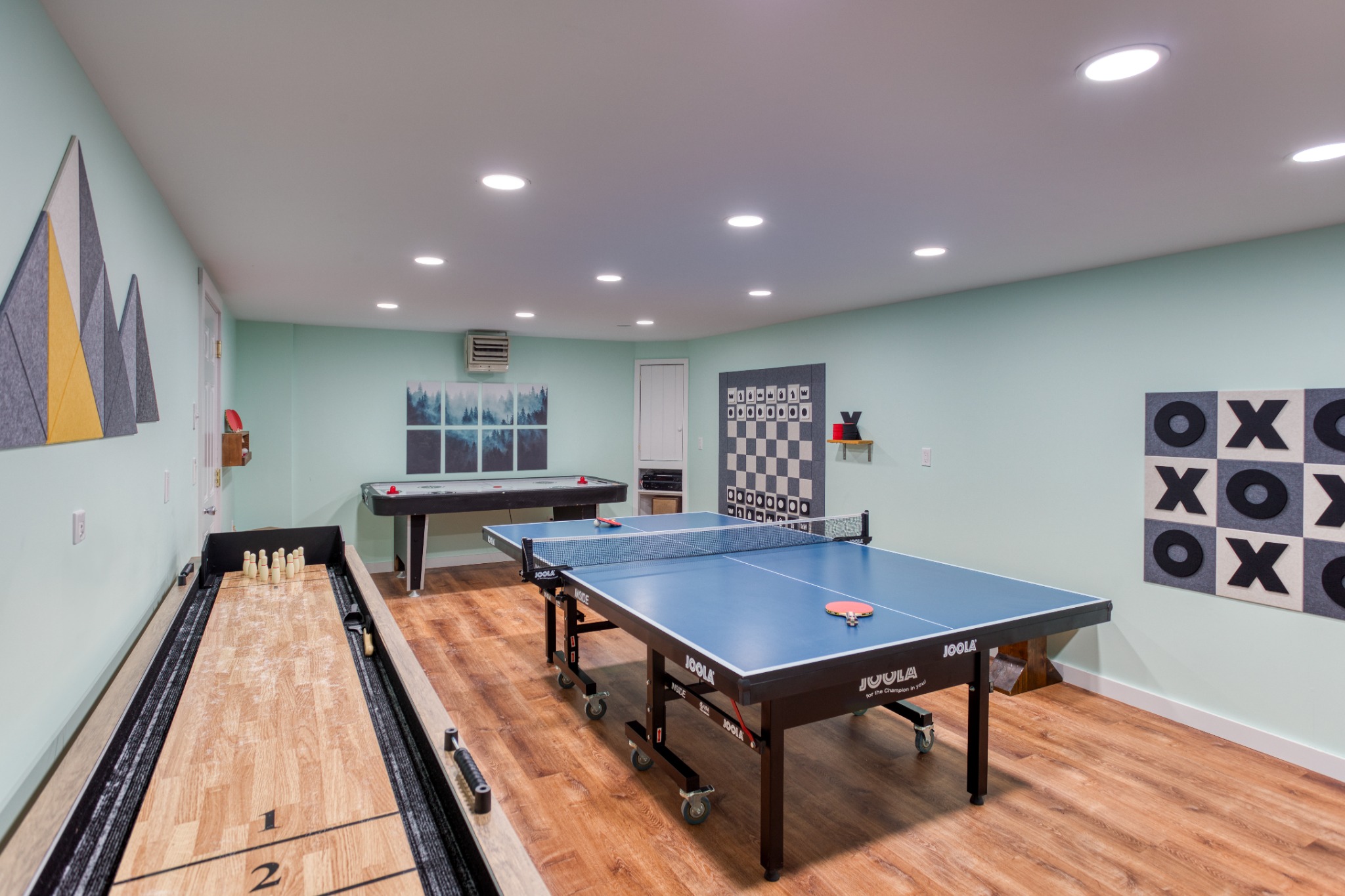 Game room with ping pong, shuffleboard and air hockey