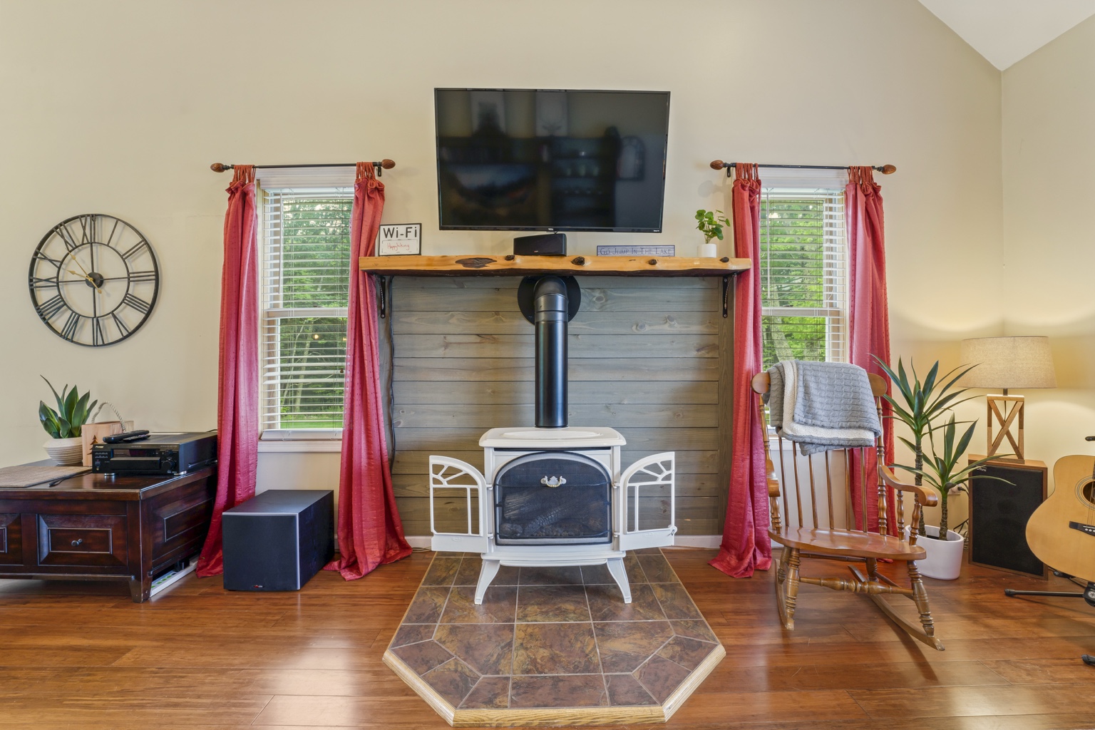Gas stove and TV in the vaulted living room